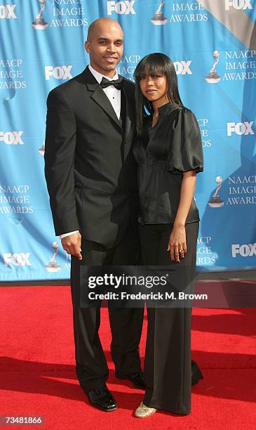 Actor Kadir Nelson and guest arrives at the 38th annual NAACP Image Awards held at the Shrine Auditorium on March 2, 2007 in Los Angeles, California.