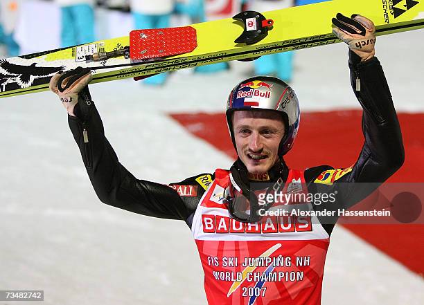 Adam Malysz of Poland celebrates winning the Gold Medal after winning the Normal Hill Individual Event during the FIS Nordic World Ski Championships...