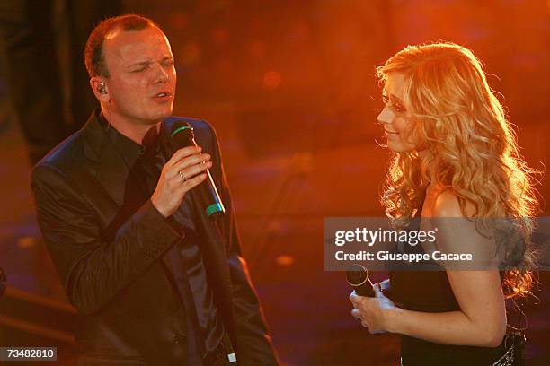 Gigi D'Alessio and Lara Fabiani perform on stage during the fourth day of the 57th Sanremo Music Festival at Tetro Ariston on March 2, 2007 in...