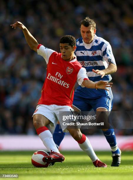 Denilson of Arsenal shields the ball from Glen Little of Reading during the Barclays Premiership match between Arsenal and Reading at The Emirates...