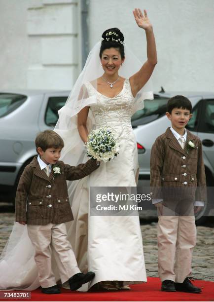 Princess Alexandra of Denmark and her children Prince Felix and Prince Nicolai arrive for her wedding ceremony to photographer Martin Jorgensen at...