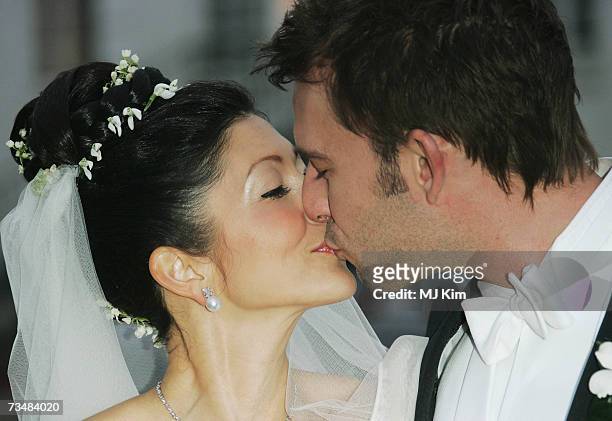 Princess Alexandra of Denmark kisses her husband Martin Jorgensen after their wedding ceremony at Oster Egende Church on March 3, 2007 in Fakse,...