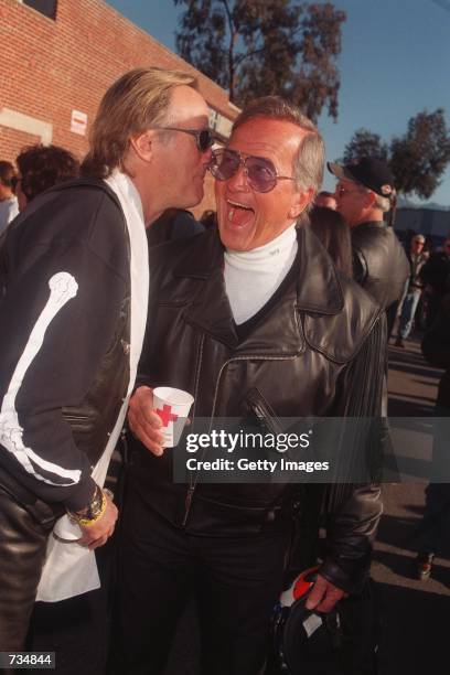 Peter Fonda and Pat Boone share a laugh November 12, 2000 at Love Ride 17 in Glendale, CA.