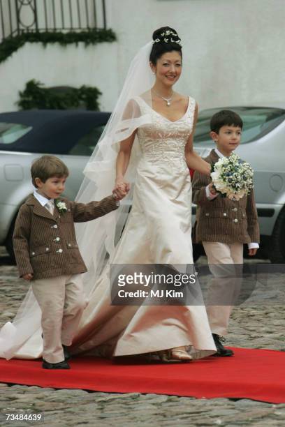 Princess Alexandra of Denmark and her children Prince Felix and Prince Nicolai arrive for her wedding ceremony to photographer Martin Jorgensen at...