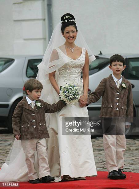 Princess Alexandra of Denmark and her children Prince Felix and Prince Nicolai arrive for her wedding ceremony to Martin Jorgensen at Oster Egende...