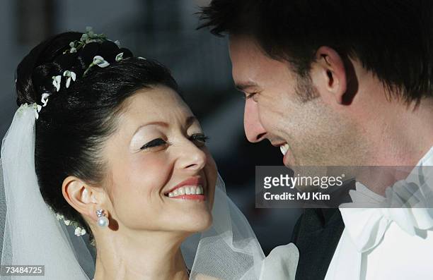 Princess Alexandra of Denmark and her husband Martin Jorgensen pose for photographers after their wedding ceremony at Oster Egende Church on March...