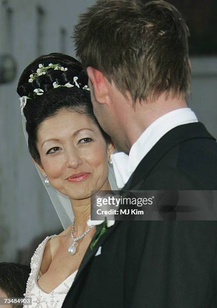 Princess Alexandra of Denmark and her husband Martin Jorgensen pose for photographers after their wedding ceremony at Oster Egende Church on March 3,...