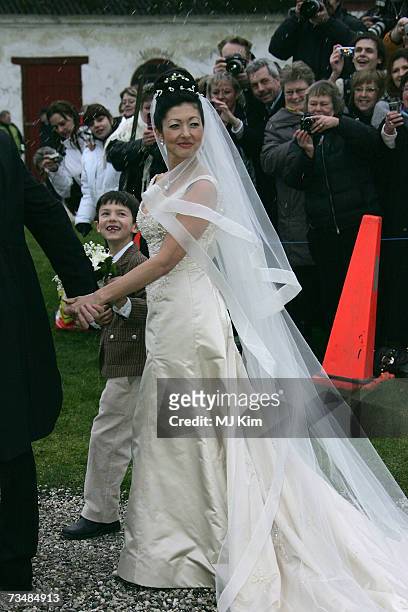Princess Alexandra of Denmark and her son Prince Nicolai pose for photographers after her wedding ceremony at Oster Egende Church on March 03, 2007...