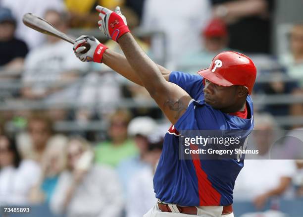 Ryan Howard of the Philadelphia Phillies hits a first inning double against the Boston Red Sox during a Spring Training game at City of Palms Park...