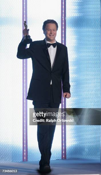German director Florian Henckel von Donnersmarck, appears on stage with his Oscar Award for Best Foreign Language Film at the live broadcast of...