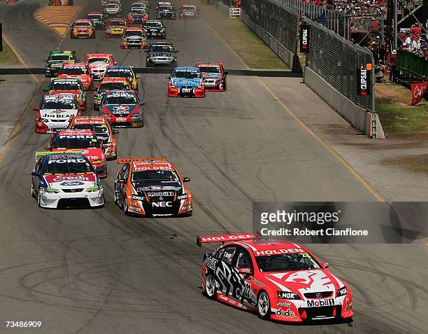 Todd Kelly of the Holden Racing Team leads the start of race two of the Clipsal 500 V8 Supercars on the Adelaide Street Circuit on March 3, 2007 in...