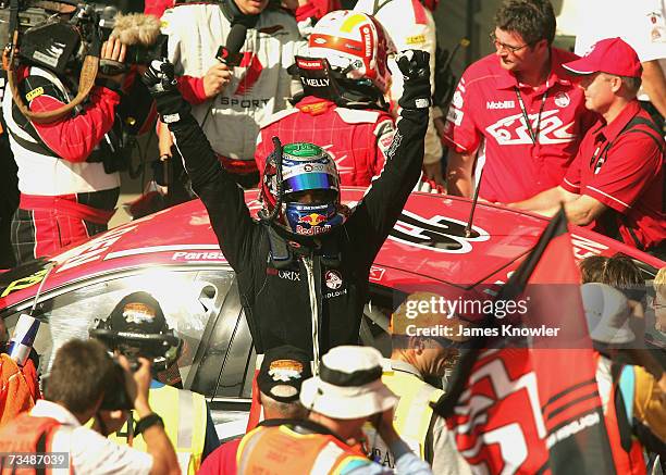 Rick Kelly of the Toll HSV Dealer Team celebrates after winning race two of the Clipsal 500 V8 Supercars on the Adelaide Street Circuit on March 3,...