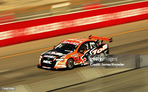 Rick Kelly of the Toll HSV Dealer Team approaching the finish line to win race two of the Clipsal 500 V8 Supercars on the Adelaide Street Circuit on...