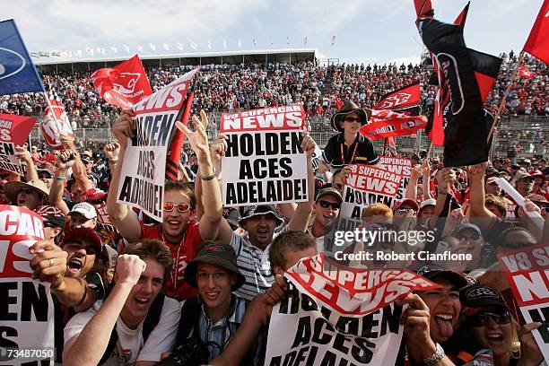 Holden Fans celebrate after Rick Kelly of the Toll HSV Dealer Team won the Clipsal 500 V8 Supercars on the Adelaide Street Circuit on March 3, 2007...