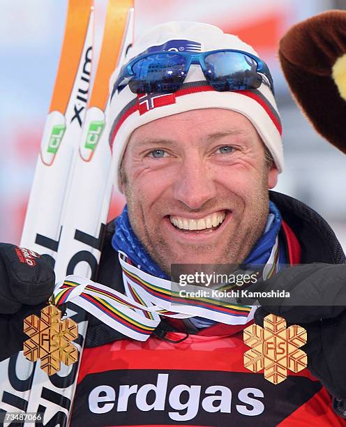 Odd-Bjoern Hjelmeset of Norway poses with his Gold Medal for the Mens Cross Country Skiing 50km classical Mass Start Final during the FIS Nordic...