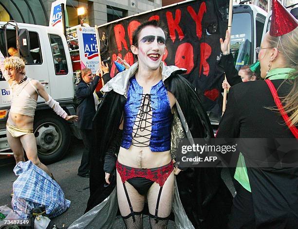 Participant dressed in a "Rocky Horror Picture Show" them gets ready to take part in the festivities for Sydney's Gay and Lesbian Mardi Gras parade,...