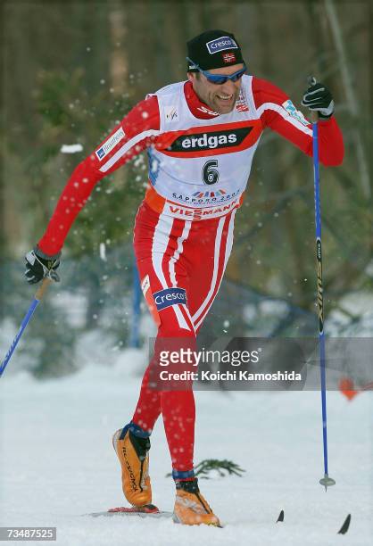 Odd-Bjoern Hjelmeset of Norway on his way to taking the Gold Medal in the Mens Cross Country Skiing 50km classical Mass Start Final during the FIS...