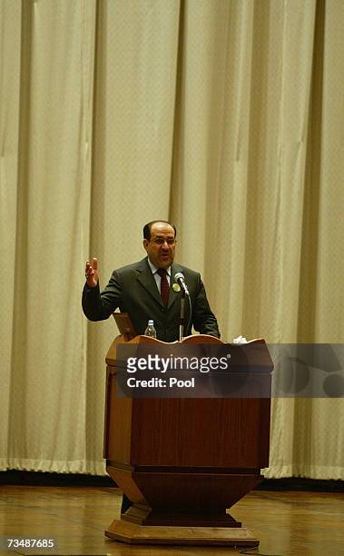 Iraqi Prime Minister Nouri al-Maliki talks during a press briefing at the National reconciliation conference of the former Iraqi army officers March...