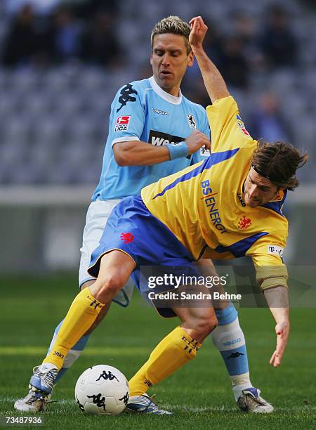 Torben Hofmann of 1860 Munich challenges Patrick Bick of Braunschweig during the Second Bundesliga match between 1860 Munich and Eintracht...