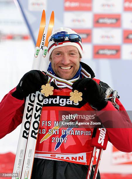 Odd-Bjoern Hjelmeset of Norway celebrates winning the Gold Medal during the FIS Nordic World Ski Championships Cross Country Men's Mass Start Classic...