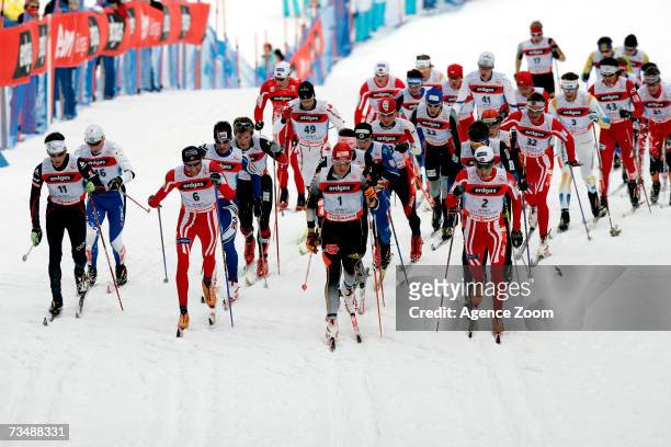 Skiers competes during the FIS Nordic World Ski Championships Cross Country Men's Mass Start Classic 50.00 KM event on March 04, 2007 in Sapporo,...