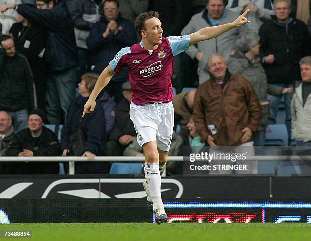 London, UNITED KINGDOM: West Ham's Mark Noble celebrates his first half goal against Tottenham Hotspur in their Barclays Premiership League clash at...