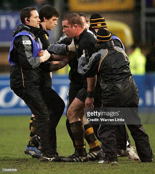 Phil Vickery of London Wasps is helped off the pitch injured during the Guinness Premiership match between London Wasps and Bristol Rugby at Adams...