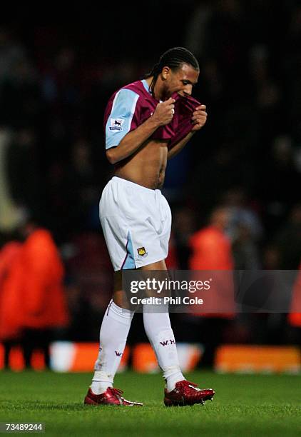Dejected Anton Ferdinand of West Ham walks off the pitch as the final whistle during the Barclays Premiership match between West Ham United and...