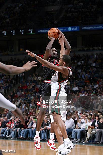 Luol Deng of the Chicago Bulls shoots against Maurice Williams of the Milwaukee Bucks on March 4, 2007 at the Bradley Center in Milwaukee, Wisconsin....