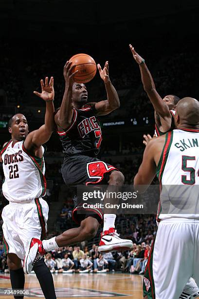 Ben Gordon of the Chicago Bulls shoots a layup against Michael Redd and Maurice Williams of the Milwaukee Bucks on March 4, 2007 at the Bradley...