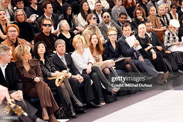 Bernard and Helene Arnault, Maggy Chang, Yves and Rebecca Carcelle, Audrey Marnay and Lee Radziwil attend the Louis Vuitton fashion show during Paris...