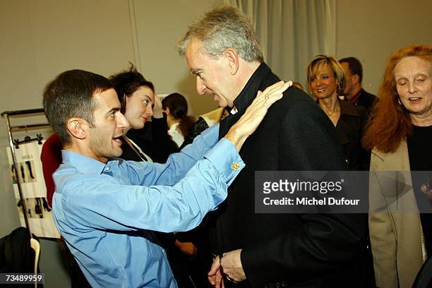 Marc Jacobs and Bernard Arnault attend the Louis Vuitton fashion show during Paris fashion week Fall/Winter 2008 at Cour carre du Louvre on March 4,...