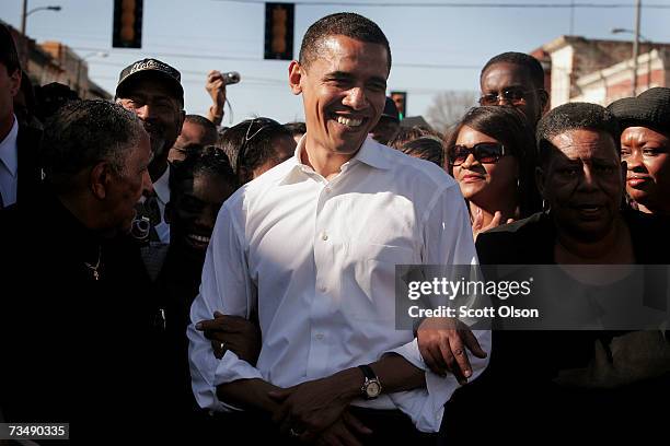 Presidential candidate Senator Barack Obama marches with a crowd to the Edmund Pettus Bridge to commemorate the 1965 "Bloody Sunday" Voting Rights...