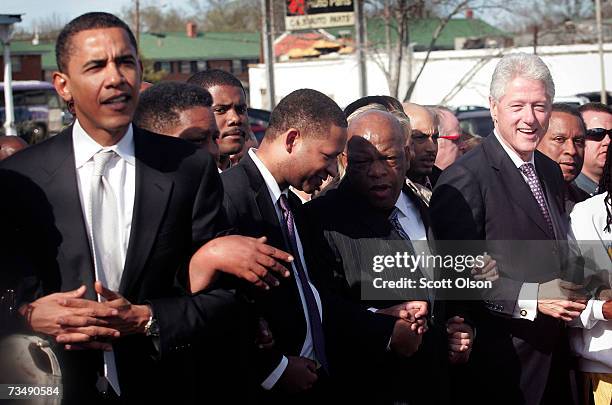 Democratic Presidential candidate Senator Barack Obama and former President Bill Clinton march to the Edmund Pettus Bridge to commemorate the 1965...