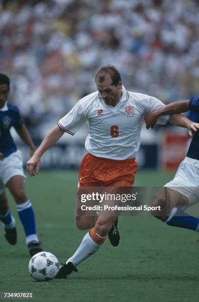 Dutch midfielder Jan Wouters pictured preparing to shoot during play in the 1994 FIFA World Cup quarter-final match between Netherlands and Brazil at...