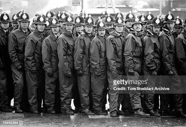 Police line during a confrontation with miners at the Orgreave coking plant in South Yorkshire, 18th June 1984. The most violent incident of the UK...