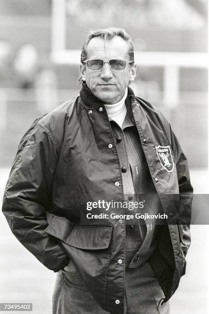 Owner Al Davis of the Oakland Raiders on the field before a game against the Cleveland Browns at Municipal Stadium on October 9, 1977 in Cleveland,...