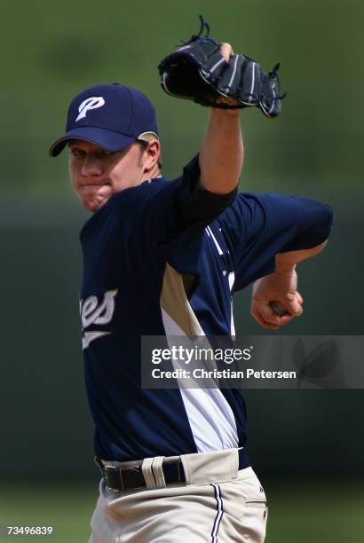 Starting pitcher Jake Peavy of the San Diego Padres pitches against the Kansas City Royals during the MLB spring training game on March 5, 2007 at...