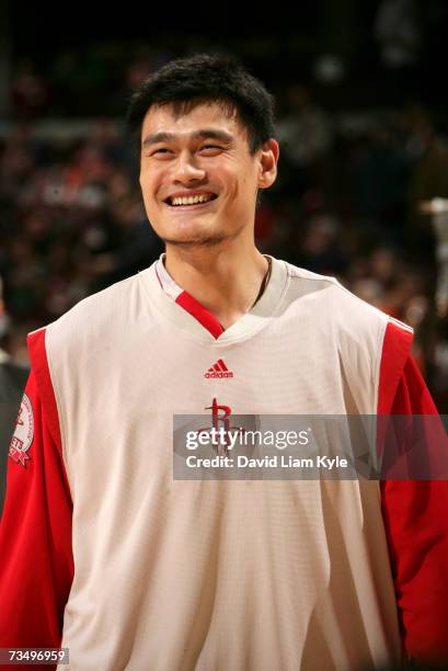 Yao Ming of the Houston Rockets begins warming up for NBA game play against the Cleveland Cavaliers at The Quicken Loans Arena March 5, 2007 in...