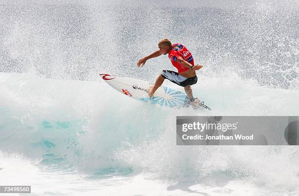 Mick Fanning of Australia competes during his heat against Jake Paterson of Australia in round three of the Quiksilver Pro Gold Coast at Snapper...