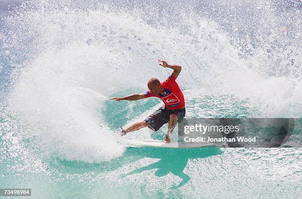 Kelly Slater of the USA competes during his heat against Julian Wilson of Australia in round three of the Quiksilver Pro Gold Coast at Snapper Rocks...