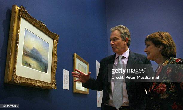 Prime Minister Tony Blair and Secretary of State for Culture, Media and Sport Tessa Jowell look at Turner's The Blue Riga at the Tate Britain gallery...