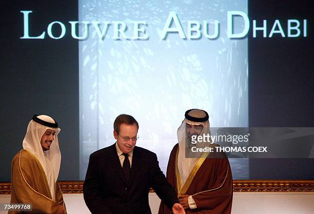 Abu Dhabi, UNITED ARAB EMIRATES: French Culture Minister Renaud Donnedieu de Vabres attends with the head of Abu Dhabi Tourism Authority, Sheikh...