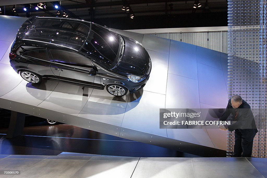 A visitor takes a picture of an Opel Cor...