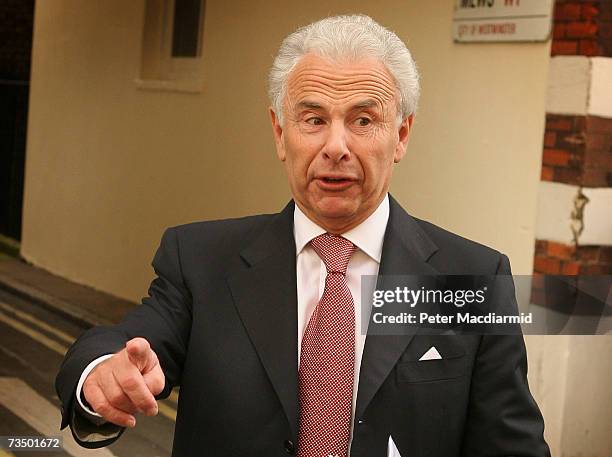 Lord Levy gestures to photographers as he leaves his office on March 6, 2007 in London. Labour Party chief fundraiser Lord Levy is at the centre of...