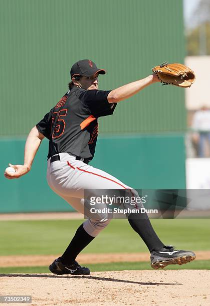 Pitcher Barry Zito of the San Francisco Giants throws a pitch against the Chicago Cubs during spring training March 1, 2007 at Hohokam Park in Mesa,...