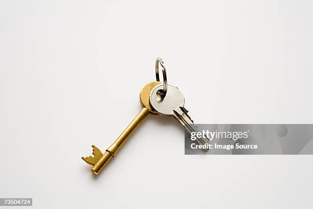 house keys - house keys stock-fotos und bilder