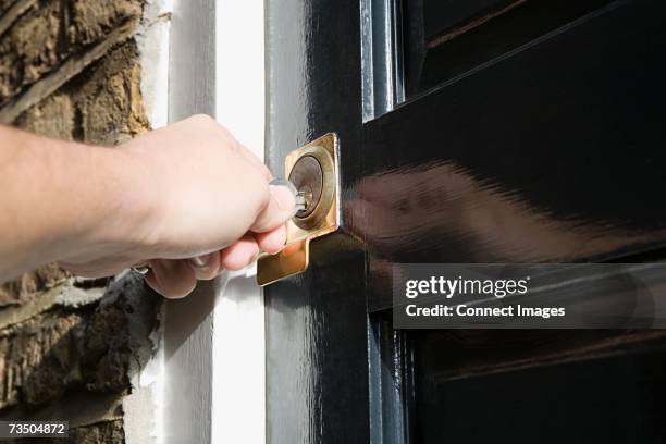 Putting Key In Door Putting Key In Door Photos and Premium High Res Pictures - Getty Images