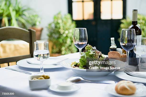 a meal in a restaurant - table wine food stockfoto's en -beelden