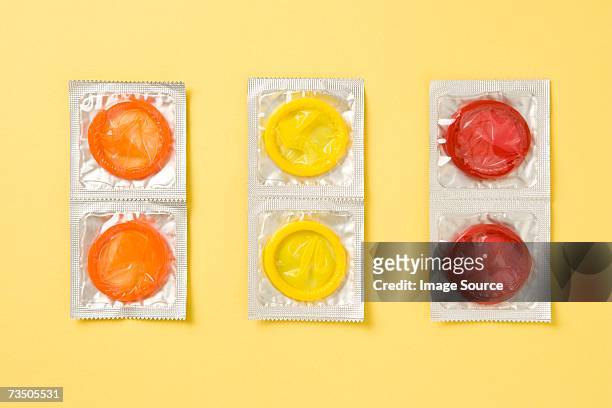 six condoms - condoms stock pictures, royalty-free photos & images